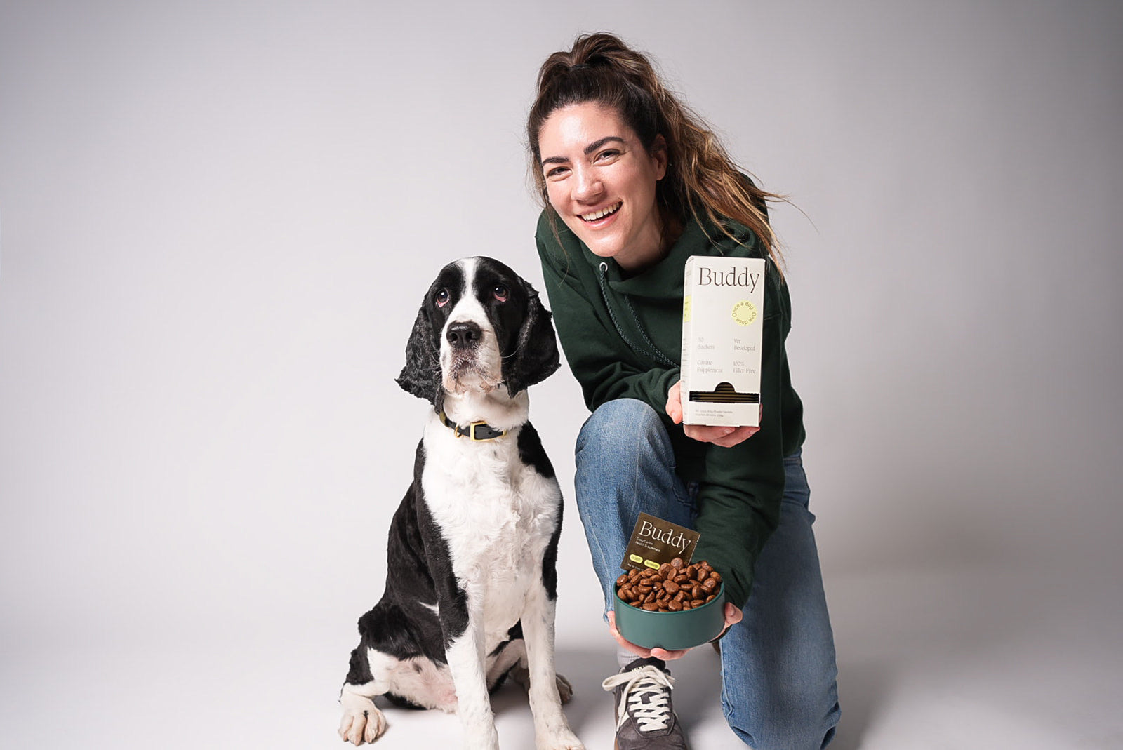 Maddie and Rudder with Buddy's daily meal topper